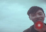 Image of Vietnamese villagers with US soldiers Vietnam, 1967, second 55 stock footage video 65675079546