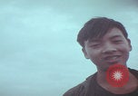 Image of Vietnamese villagers with US soldiers Vietnam, 1967, second 57 stock footage video 65675079546