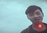 Image of Vietnamese villagers with US soldiers Vietnam, 1967, second 59 stock footage video 65675079546