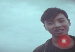 Image of Vietnamese villagers with US soldiers Vietnam, 1967, second 61 stock footage video 65675079546