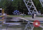 Image of NASA researcher testing EVA control backpack Hampton Virginia USA, 1968, second 4 stock footage video 65675079599