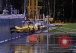 Image of NASA researcher testing EVA control backpack Hampton Virginia USA, 1968, second 32 stock footage video 65675079599