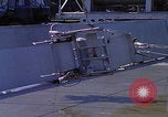 Image of NASA men fixing peroxide-powered EVA backpack Hampton Virginia USA, 1968, second 3 stock footage video 65675079600