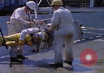Image of NASA men fixing peroxide-powered EVA backpack Hampton Virginia USA, 1968, second 8 stock footage video 65675079600