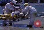 Image of NASA men fixing peroxide-powered EVA backpack Hampton Virginia USA, 1968, second 11 stock footage video 65675079600