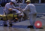 Image of NASA men fixing peroxide-powered EVA backpack Hampton Virginia USA, 1968, second 13 stock footage video 65675079600