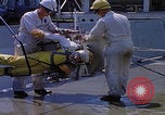 Image of NASA men fixing peroxide-powered EVA backpack Hampton Virginia USA, 1968, second 14 stock footage video 65675079600