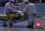 Image of NASA men fixing peroxide-powered EVA backpack Hampton Virginia USA, 1968, second 15 stock footage video 65675079600