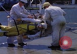 Image of NASA men fixing peroxide-powered EVA backpack Hampton Virginia USA, 1968, second 18 stock footage video 65675079600