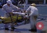 Image of NASA men fixing peroxide-powered EVA backpack Hampton Virginia USA, 1968, second 20 stock footage video 65675079600