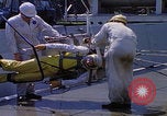 Image of NASA men fixing peroxide-powered EVA backpack Hampton Virginia USA, 1968, second 21 stock footage video 65675079600