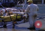 Image of NASA men fixing peroxide-powered EVA backpack Hampton Virginia USA, 1968, second 23 stock footage video 65675079600
