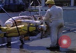 Image of NASA men fixing peroxide-powered EVA backpack Hampton Virginia USA, 1968, second 24 stock footage video 65675079600