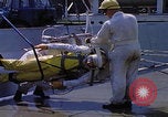 Image of NASA men fixing peroxide-powered EVA backpack Hampton Virginia USA, 1968, second 25 stock footage video 65675079600