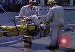 Image of NASA men fixing peroxide-powered EVA backpack Hampton Virginia USA, 1968, second 28 stock footage video 65675079600