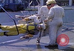 Image of NASA men fixing peroxide-powered EVA backpack Hampton Virginia USA, 1968, second 29 stock footage video 65675079600