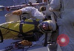Image of NASA men fixing peroxide-powered EVA backpack Hampton Virginia USA, 1968, second 30 stock footage video 65675079600