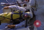Image of NASA men fixing peroxide-powered EVA backpack Hampton Virginia USA, 1968, second 31 stock footage video 65675079600