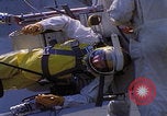Image of NASA men fixing peroxide-powered EVA backpack Hampton Virginia USA, 1968, second 32 stock footage video 65675079600