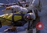Image of NASA men fixing peroxide-powered EVA backpack Hampton Virginia USA, 1968, second 34 stock footage video 65675079600