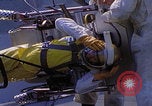 Image of NASA men fixing peroxide-powered EVA backpack Hampton Virginia USA, 1968, second 37 stock footage video 65675079600