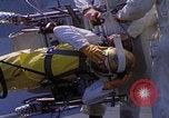 Image of NASA men fixing peroxide-powered EVA backpack Hampton Virginia USA, 1968, second 39 stock footage video 65675079600