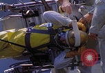 Image of NASA men fixing peroxide-powered EVA backpack Hampton Virginia USA, 1968, second 43 stock footage video 65675079600