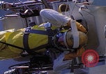 Image of NASA men fixing peroxide-powered EVA backpack Hampton Virginia USA, 1968, second 44 stock footage video 65675079600