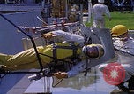 Image of NASA men fixing peroxide-powered EVA backpack Hampton Virginia USA, 1968, second 49 stock footage video 65675079600