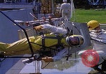 Image of NASA men fixing peroxide-powered EVA backpack Hampton Virginia USA, 1968, second 52 stock footage video 65675079600