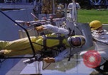 Image of NASA men fixing peroxide-powered EVA backpack Hampton Virginia USA, 1968, second 56 stock footage video 65675079600