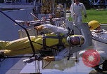 Image of NASA men fixing peroxide-powered EVA backpack Hampton Virginia USA, 1968, second 59 stock footage video 65675079600