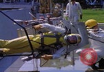 Image of NASA men fixing peroxide-powered EVA backpack Hampton Virginia USA, 1968, second 60 stock footage video 65675079600