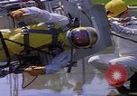 Image of NASA men fixing peroxide-powered EVA backpack Hampton Virginia USA, 1968, second 61 stock footage video 65675079600