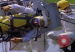 Image of NASA men fixing peroxide-powered EVA backpack Hampton Virginia USA, 1968, second 62 stock footage video 65675079600