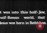 Image of mother wraps baby in swaddle Bethlehem Palestine, 1941, second 6 stock footage video 65675079605