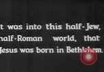 Image of mother wraps baby in swaddle Bethlehem Palestine, 1941, second 9 stock footage video 65675079605