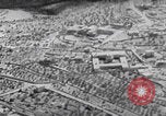 Image of mother wraps baby in swaddle Bethlehem Palestine, 1941, second 15 stock footage video 65675079605