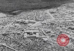 Image of mother wraps baby in swaddle Bethlehem Palestine, 1941, second 17 stock footage video 65675079605