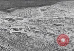 Image of mother wraps baby in swaddle Bethlehem Palestine, 1941, second 19 stock footage video 65675079605