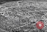 Image of mother wraps baby in swaddle Bethlehem Palestine, 1941, second 22 stock footage video 65675079605