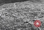Image of mother wraps baby in swaddle Bethlehem Palestine, 1941, second 23 stock footage video 65675079605