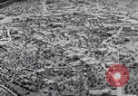 Image of mother wraps baby in swaddle Bethlehem Palestine, 1941, second 24 stock footage video 65675079605