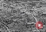 Image of mother wraps baby in swaddle Bethlehem Palestine, 1941, second 25 stock footage video 65675079605