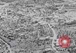 Image of mother wraps baby in swaddle Bethlehem Palestine, 1941, second 27 stock footage video 65675079605