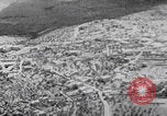 Image of mother wraps baby in swaddle Bethlehem Palestine, 1941, second 29 stock footage video 65675079605