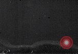Image of mother wraps baby in swaddle Bethlehem Palestine, 1941, second 46 stock footage video 65675079605