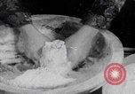 Image of Palestinian boy and mother making bread Palestine, 1941, second 6 stock footage video 65675079606
