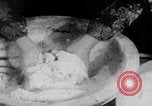 Image of Palestinian boy and mother making bread Palestine, 1941, second 9 stock footage video 65675079606