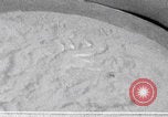 Image of Palestinian boy and mother making bread Palestine, 1941, second 13 stock footage video 65675079606